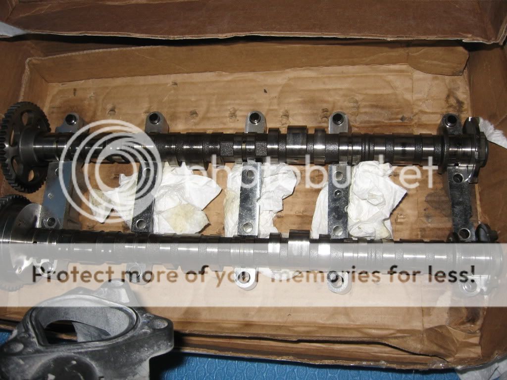 k20a2/k24a4 partout. k20a2 head, cams, rocker assembly, throttle body